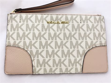 ballet pink michael kors large wristlet|Michael Kors wallet.